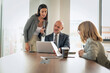 © gzorgz - Business colleagues discussing project during meeting in modern office