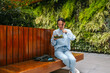 © ADDICTIVE STOCK - Businesswoman enjoying a healthy lunch break outdoors