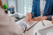 © PHOTO4U - Car purchase transaction with payment, contract signing, key handover, and customer agreement in a modern dealership office, representing automotive sales, business finance, and professional service.