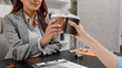© PHOTO4U - Concept of bribery, corruption, and unethical business practices with cash offered during a legal contract meeting, highlighting financial crime, integrity, compliance, and corporate ethics.