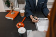 © PHOTO4U - Concept of bribery, corruption, and unethical business practices with cash offered during a legal contract meeting, highlighting financial crime, integrity, compliance, and corporate ethics.