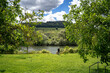 © remo_welt - Das Licht tanzte über den Hang, während die Wolken ihre Schatten langsam über die Reben schoben. Die Mosel wirkte wie ein Spiegel, der Himmel und Landschaft zu einem einzigen Gemälde verschmelzen ließ