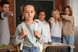 © Pixel-Shot - Bullied little girl in classroom