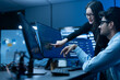 © Art_Photo - Asian happy woman and man programmer team coding software at computer in dark tech office, Concept of digital transformation, modern cyber security, startup teamwork and future IT digital network