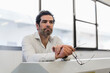 © Westend61 - Portrait of a pensive businessman in a factory