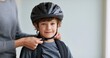 © perfectlab - Child wearing bicycle helmet with adult help