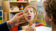 © ANMZAKARIA - Young Boy in Speech Therapy Session | Pediatric Communication Exercise with Mirror | Early Childhood Development and Oral Motor Skills Training | Child Reflection and Language Support Specialist