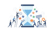 © Elizabeth - Business team works together to maintain a giant sand timer using tools, gears, and a ladder to manage their daily work productivity.