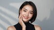 © MDLATIFUR - Young asian woman touching her smooth face with natural lighting skincare portrait cosmetics lifestyle