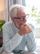 © luciano - Senior man with white hair and beard wearing glasses, showing pensiveness and contemplation, feeling thoughtful or concerned about life decisions and remembering past moments
