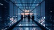 © BlackBridge Media - Business Professionals Walking Through Modern Glass Corridor at Sunset