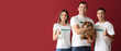 © Pixel-Shot - Group of volunteers holding dog and giving thumbs up