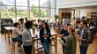 © Felippe Lopes - Diverse group of young adults networking and collaborating in a modern university common area