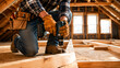 © vecto club - A man in a plaid shirt is using a drill on a wooden beam in a construction site.