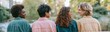 © Iryna - Group of four friends sitting on a park bench overlooking a pond back view with colorful jackets for lifestyle background banner and social media design