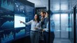 © PKArts - Female data analyst directs a team of professionals reviewing complex financial metrics on a large interactive digital display within a secure server room environment.