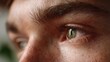 © ประหยัด พลพวก - Intense Gaze: A close-up macro shot captures the piercing gaze of a human eye, with intricate details of iris and pupil visible, conveying focus and introspection.