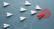 © Wajid - One red paper plane hitting target with white planes flying towards goal representing leadership and success
