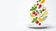 © Rowshan - Colorful fruit salad in white bowl on white background.