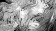 © Jassem - Abstract fluid silver liquid metal texture with wavy chrome reflections and dark background.