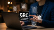 © KH Studio  - GRC Governance Risk and Compliance Concept with Businessman and Laptop