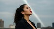 © Orchid - Ambitious Woman Gazing Upwards: A confident businesswoman in a sharp blazer looks up with determination, silhouetted against a dramatic sky with buildings in the background.