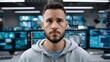 © naphat - Dystopian Glowing Cybernetic Focused Man in Front of Multiple Screens in Modern Control Room