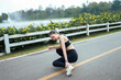 © PaeGAG - Young woman feeling ankle pain during running workout