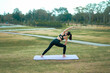 © PaeGAG - Young woman practicing yoga pose for fitness in nature