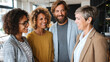 © v.stock - Smiling couple reviewing home purchase documents with a professional real estate agent during a modern apartment viewing, discussing contracts, property details, and buying decisions.