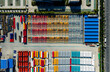 © Yic Ma/Stocksy - colorful semi-finished containers in factory yard