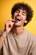 © Rawpixel.com - Joyful man enjoying chocolate delight.