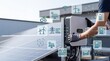 © Ming - Technician installing solar inverter with digital icons of renewable energy, wind turbines, and smart grid on rooftop for sustainable power system.