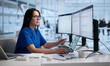 © Andrey Popov - Woman Healthcare IT Specialist Reviews Patient Electronic Medical Records