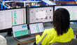 © Andrey Popov - Woman Using Laptop To Manage Warehouse Inventory