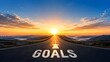 © Anhidrit'12 - Straight open asphalt road leading toward a bright rising sun with goals text painted on the highway surface, symbolizing future career vision and motivation