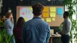 © Moshi Art - Diverse entrepreneurs collaborating during an interactive startup workshop in a modern meeting room