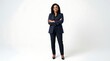 © Prima - A woman in business attire stands confidently with arms crossed in studio