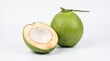 © Bintang - Fresh young green coconut fruit whole and cut in half isolated on white background