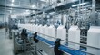© Paul - Automated production line with white liquid cartons moving through a dairy processing facility.