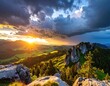 © Bride - Dramatic sunset illuminates a mountainous landscape with dramatic clouds.