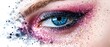 © Faustudio - Hypnotic eye with creative makeup and sparkles.