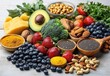 © btiger - Vibrant, nourishing spread of fresh blueberries, strawberries, avocado, broccoli, cheese, assorted nuts, chia seeds, turmeric and herbs