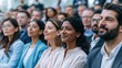 © Maksims - Diverse business professionals attending a conference seminar leadership presentation corporate training or networking event in a modern auditorium