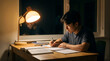 © SIMANG - Young man studying attentively at a wooden desk under warm desk lamp light at night