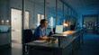 © Hudson - Nurse Working Late Shift In Hospital Desk Lamp Glow