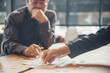 © aFotostock - Business jigsaw puzzle connections strategy synergy team solution. Stakeholders business trusted communicate teams hands holding jigsaw puzzle synergy. Implement puzzle communication solve synergy