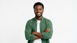 © creative png  - Happy young african american man wearing a green shirt smiling with his arms crossed looking at the camera confidently