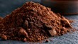 © Charlie - Freshly milled coffee grounds on dark slate surface, textured powder background for cafe banner, commercial food template