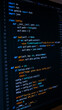 © Jason Yoder - Closeup of computer monitor displaying colorful Python source code
